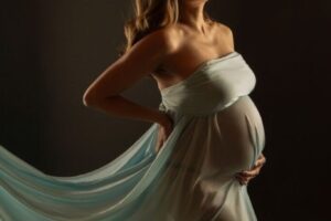 zwangerschapsfotografie silver aura award blauw-groene jurk